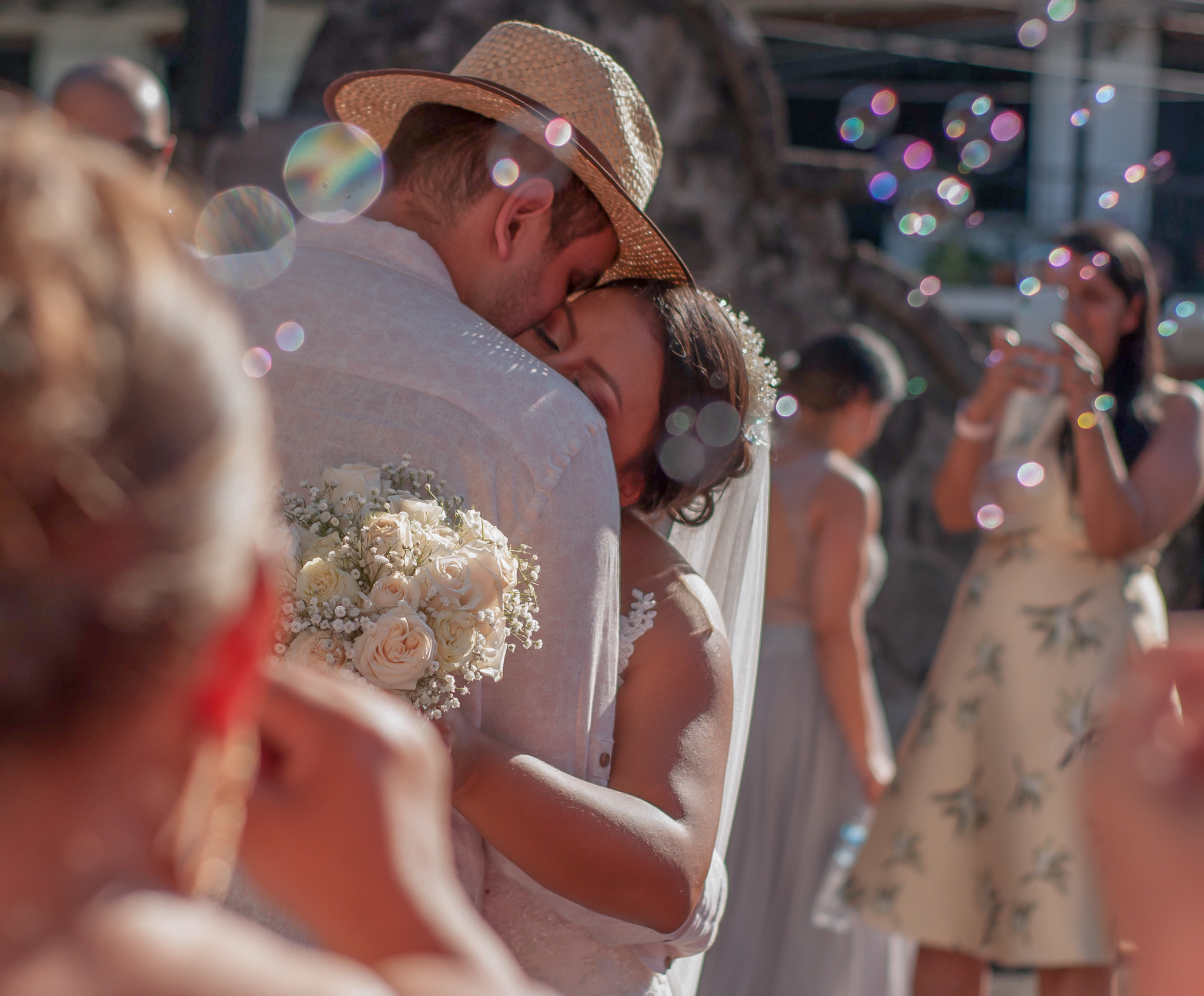 A couple hugging at a wedding